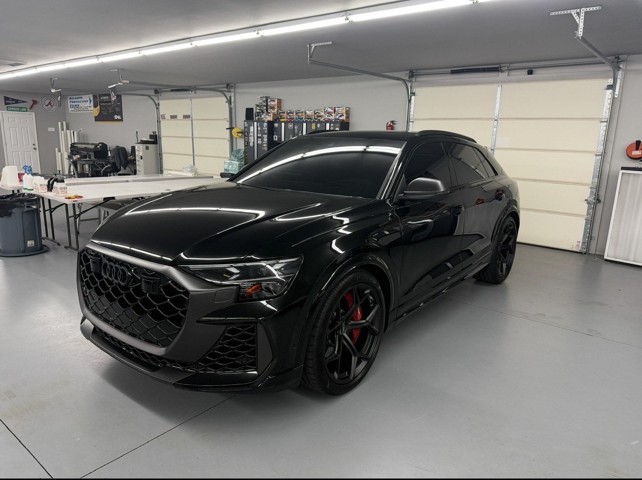 Black Audi RS Q8 with ceramic window tint inside the Doctor Tintz shop